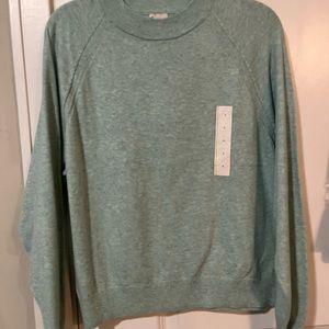 long sleeve light teal knit shirt with nice design and BRAND NEW WITH TAGS